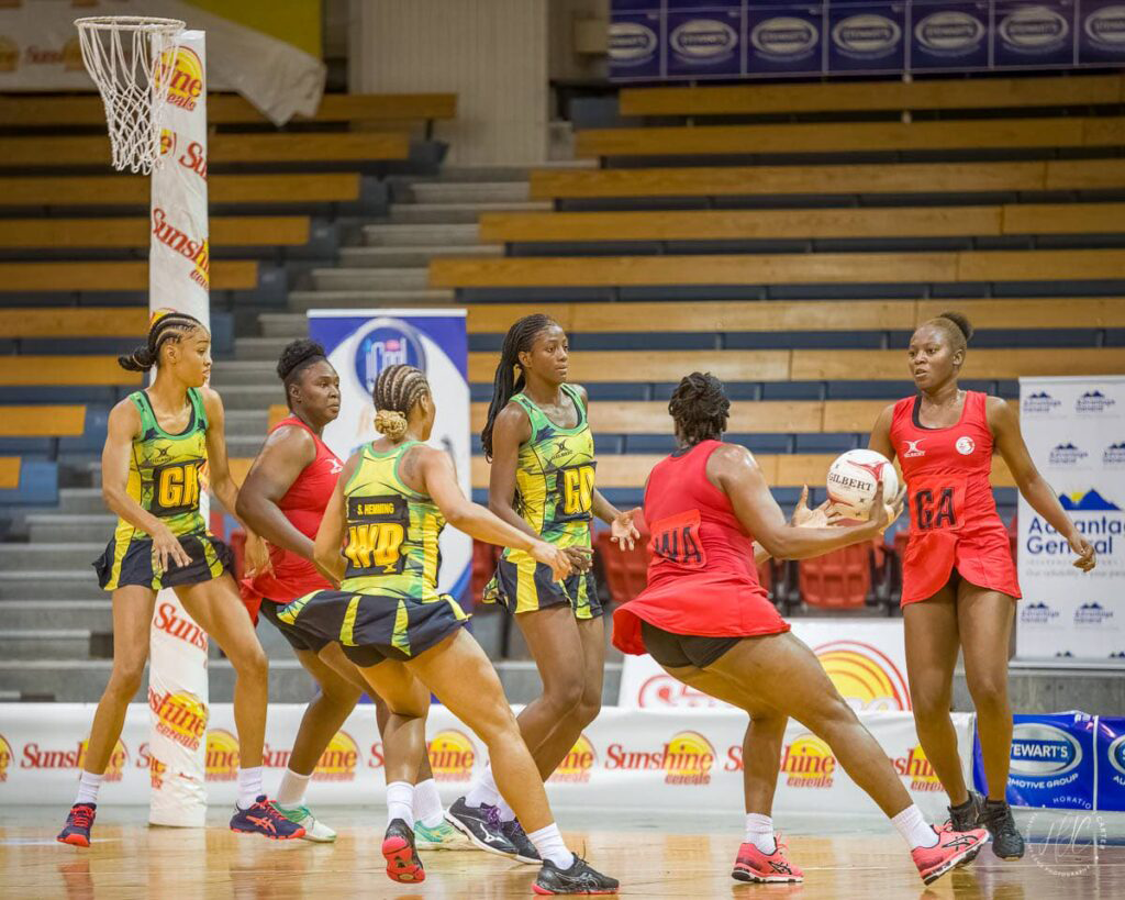 In this Oct 17, 2021 file photo, TT’s women’s netballers (in red) face their Caribbean rivals Jamaica during the Magaret Beckford netball series, in Kingston, Jamaica. -