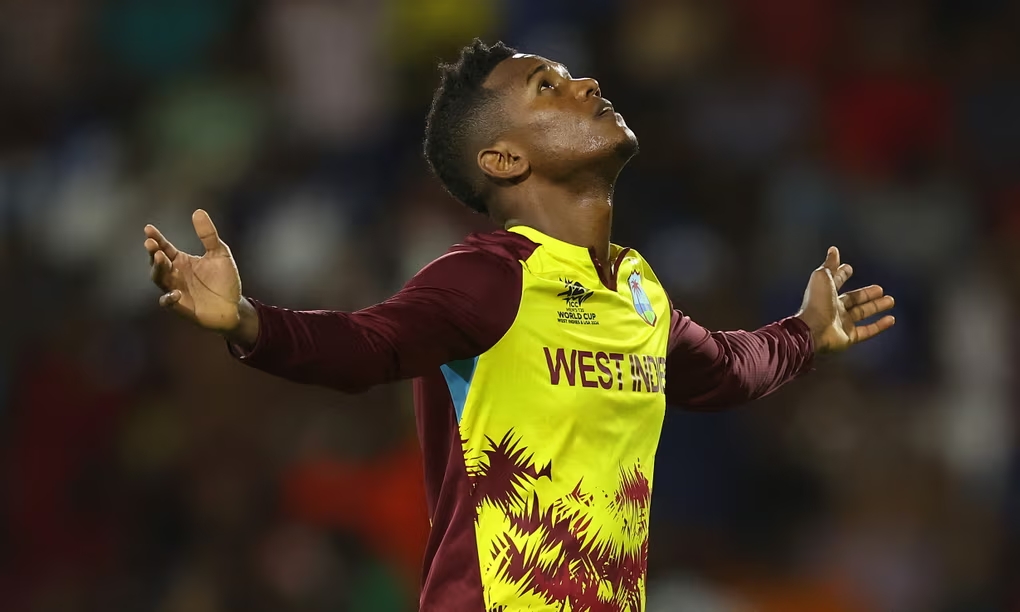 Akeal Hosein celebrates dismissing Azmatullah Omarzai of Afghanistan, one of his nine wickets so far in this year’s tournament. Photograph: Robert Cianflone/Getty Images (Image obtained at theguardian.com)