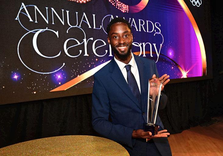 MORE TO ACHIEVE: TTOC Sportsman of the Year Jereem Richards shows off the hardware after collecting his award during the TTOC’s gala Annual Awards Ceremony, at the Government Plaza auditorium, in Port of Spain, on Sunday evening. --Photos: JERMAINE CRUICKSHANK (Image obtained at trinidadexpress.com)